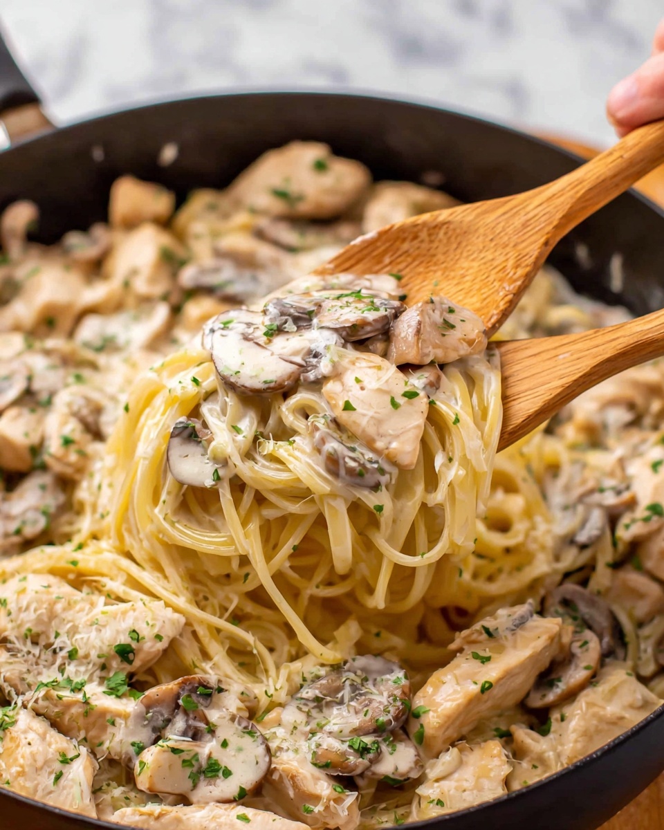 Creamy Chicken Fettuccine Alfredo with Mushrooms and Parsley Recipe - Recipe Image