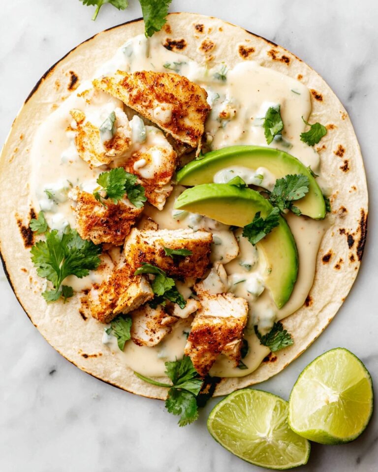 Salmon Tacos with Cilantro Slaw and Creamy Sriracha Lime Sauce Recipe