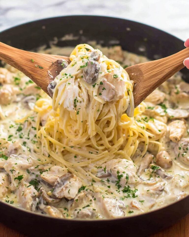 Creamy Chicken Fettuccine Alfredo with Mushrooms and Parsley Recipe