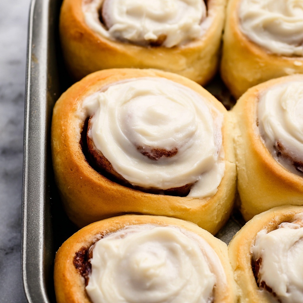 Homemade Cinnamon Rolls with Maple Cream Cheese Frosting Recipe - Recipe Image